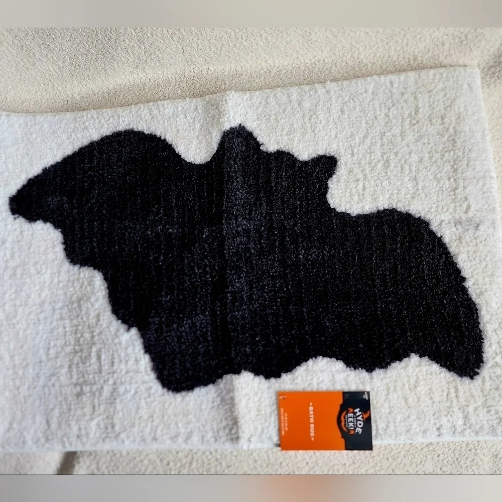 New Hyde and eek Halloween cream color Bath Rug with a black bat print